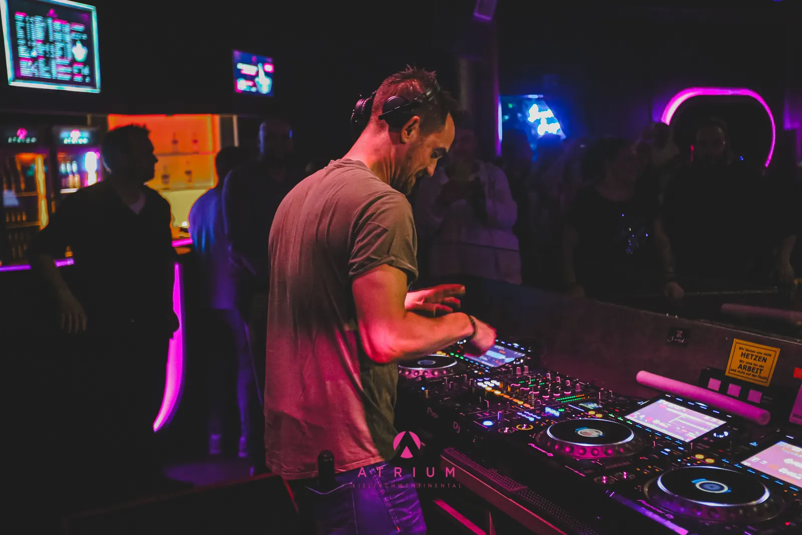 Special D. behind the decks in a club