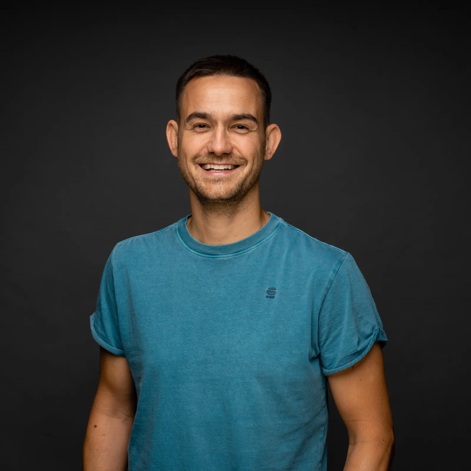 Special D. portrait on a dark background